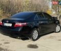 Черный Тойота Камри, объемом двигателя 2.4 л и пробегом 244 тыс. км за 8700 $, фото 5 на Automoto.ua