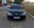 Черный Тойота Камри, объемом двигателя 2.4 л и пробегом 322 тыс. км за 7000 $, фото 1 на Automoto.ua