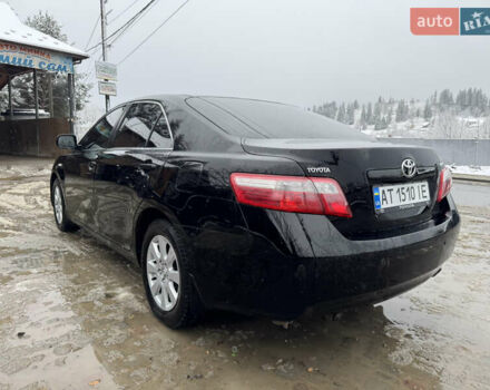 Чорний Тойота Камрі, об'ємом двигуна 2.4 л та пробігом 260 тис. км за 10500 $, фото 6 на Automoto.ua