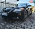 Черный Тойота Камри, объемом двигателя 2.36 л и пробегом 350 тыс. км за 8500 $, фото 1 на Automoto.ua