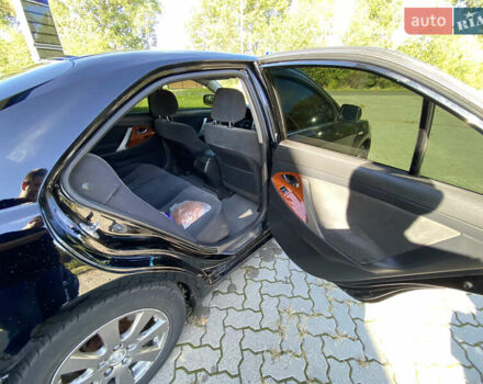 Черный Тойота Камри, объемом двигателя 2.4 л и пробегом 344 тыс. км за 7700 $, фото 13 на Automoto.ua