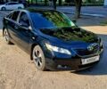 Черный Тойота Камри, объемом двигателя 3.5 л и пробегом 240 тыс. км за 9500 $, фото 1 на Automoto.ua