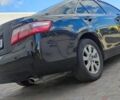 Черный Тойота Камри, объемом двигателя 2.4 л и пробегом 334 тыс. км за 8200 $, фото 1 на Automoto.ua