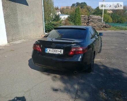 Чорний Тойота Камрі, об'ємом двигуна 2.36 л та пробігом 270 тис. км за 8800 $, фото 6 на Automoto.ua