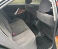 Чорний Тойота Камрі, об'ємом двигуна 2.4 л та пробігом 240 тис. км за 10300 $, фото 9 на Automoto.ua