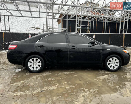Чорний Тойота Камрі, об'ємом двигуна 2.4 л та пробігом 260 тис. км за 10500 $, фото 4 на Automoto.ua