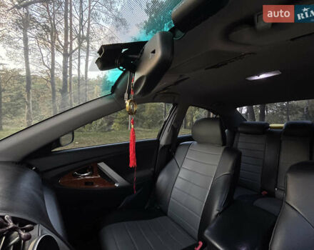 Черный Тойота Камри, объемом двигателя 2.36 л и пробегом 164 тыс. км за 8900 $, фото 24 на Automoto.ua