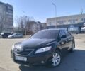 Черный Тойота Камри, объемом двигателя 2.4 л и пробегом 280 тыс. км за 8500 $, фото 1 на Automoto.ua