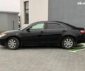 Чорний Тойота Камрі, об'ємом двигуна 2.4 л та пробігом 224 тис. км за 7990 $, фото 4 на Automoto.ua