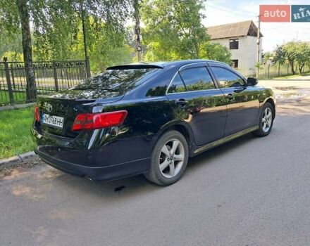 Черный Тойота Камри, объемом двигателя 3.46 л и пробегом 290 тыс. км за 9900 $, фото 22 на Automoto.ua