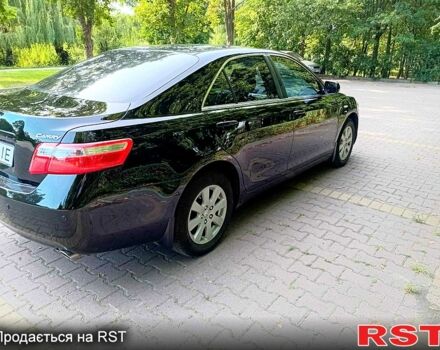 Черный Тойота Камри, объемом двигателя 2.4 л и пробегом 248 тыс. км за 7500 $, фото 3 на Automoto.ua