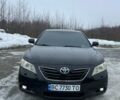 Черный Тойота Камри, объемом двигателя 2.36 л и пробегом 230 тыс. км за 9200 $, фото 1 на Automoto.ua