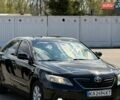 Черный Тойота Камри, объемом двигателя 2.4 л и пробегом 192 тыс. км за 8999 $, фото 1 на Automoto.ua