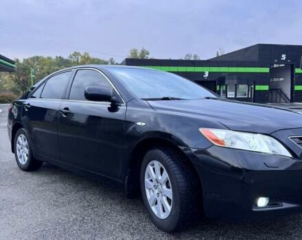Черный Тойота Камри, объемом двигателя 2.4 л и пробегом 240 тыс. км за 8700 $, фото 1 на Automoto.ua