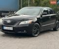 Чорний Тойота Камрі, об'ємом двигуна 2.4 л та пробігом 249 тис. км за 5950 $, фото 1 на Automoto.ua