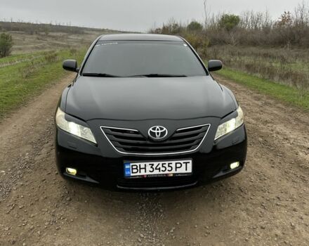 Черный Тойота Камри, объемом двигателя 2.4 л и пробегом 212 тыс. км за 8000 $, фото 1 на Automoto.ua