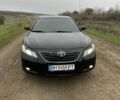 Черный Тойота Камри, объемом двигателя 2.4 л и пробегом 212 тыс. км за 8000 $, фото 1 на Automoto.ua