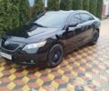 Черный Тойота Камри, объемом двигателя 3.5 л и пробегом 325 тыс. км за 9300 $, фото 1 на Automoto.ua