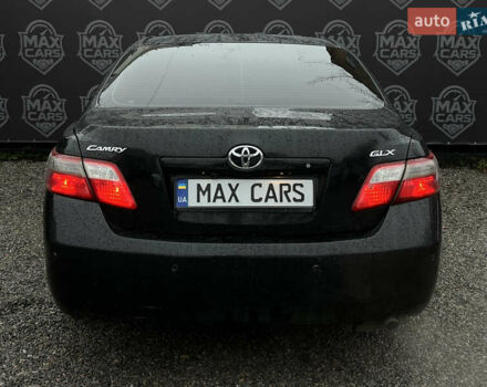 Черный Тойота Камри, объемом двигателя 2.4 л и пробегом 208 тыс. км за 7900 $, фото 5 на Automoto.ua