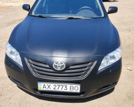 Черный Тойота Камри, объемом двигателя 2.4 л и пробегом 267 тыс. км за 8200 $, фото 1 на Automoto.ua