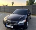 Черный Тойота Камри, объемом двигателя 2.4 л и пробегом 288 тыс. км за 7600 $, фото 1 на Automoto.ua