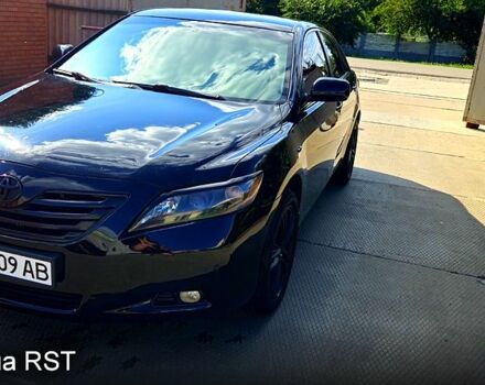 Черный Тойота Камри, объемом двигателя 2.4 л и пробегом 233 тыс. км за 8500 $, фото 1 на Automoto.ua