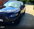 Черный Тойота Камри, объемом двигателя 2.4 л и пробегом 233 тыс. км за 8500 $, фото 1 на Automoto.ua
