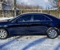 Чорний Тойота Камрі, об'ємом двигуна 2.4 л та пробігом 240 тис. км за 10300 $, фото 2 на Automoto.ua
