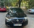 Черный Тойота Камри, объемом двигателя 2.4 л и пробегом 253 тыс. км за 8100 $, фото 1 на Automoto.ua