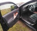 Черный Тойота Камри, объемом двигателя 2.4 л и пробегом 225 тыс. км за 9700 $, фото 1 на Automoto.ua
