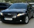 Черный Тойота Камри, объемом двигателя 2.4 л и пробегом 230 тыс. км за 7897 $, фото 1 на Automoto.ua