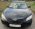 Черный Тойота Камри, объемом двигателя 2.4 л и пробегом 202 тыс. км за 9700 $, фото 1 на Automoto.ua
