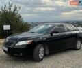 Черный Тойота Камри, объемом двигателя 2.4 л и пробегом 306 тыс. км за 5000 $, фото 1 на Automoto.ua
