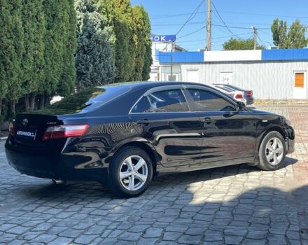 Черный Тойота Камри, объемом двигателя 2.4 л и пробегом 310 тыс. км за 7500 $, фото 3 на Automoto.ua