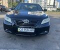 Черный Тойота Камри, объемом двигателя 2.4 л и пробегом 231 тыс. км за 7300 $, фото 1 на Automoto.ua