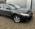 Чорний Тойота Камрі, об'ємом двигуна 2.4 л та пробігом 3 тис. км за 8000 $, фото 1 на Automoto.ua