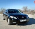 Черный Тойота Камри, объемом двигателя 2.36 л и пробегом 295 тыс. км за 8700 $, фото 1 на Automoto.ua