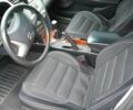 Черный Тойота Камри, объемом двигателя 2.4 л и пробегом 157 тыс. км за 7500 $, фото 1 на Automoto.ua