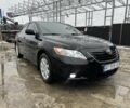 Черный Тойота Камри, объемом двигателя 2.4 л и пробегом 260 тыс. км за 10500 $, фото 2 на Automoto.ua