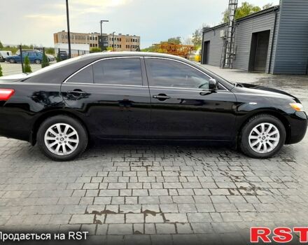 Черный Тойота Камри, объемом двигателя 2.4 л и пробегом 129 тыс. км за 8999 $, фото 1 на Automoto.ua