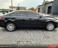 Черный Тойота Камри, объемом двигателя 2.4 л и пробегом 129 тыс. км за 8999 $, фото 1 на Automoto.ua