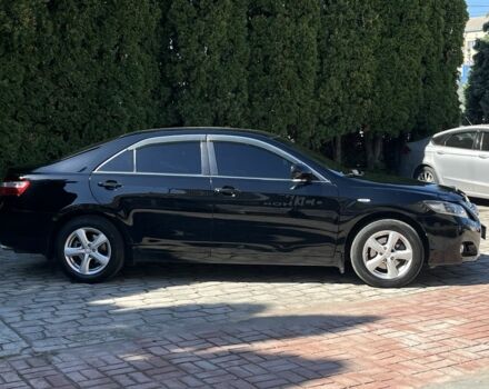 Черный Тойота Камри, объемом двигателя 2.4 л и пробегом 310 тыс. км за 7500 $, фото 2 на Automoto.ua