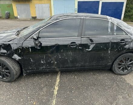 Черный Тойота Камри, объемом двигателя 2.4 л и пробегом 200 тыс. км за 4000 $, фото 1 на Automoto.ua
