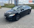Черный Тойота Камри, объемом двигателя 2.36 л и пробегом 209 тыс. км за 8999 $, фото 1 на Automoto.ua