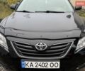 Черный Тойота Камри, объемом двигателя 2.4 л и пробегом 320 тыс. км за 7099 $, фото 1 на Automoto.ua