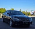 Черный Тойота Камри, объемом двигателя 2.4 л и пробегом 287 тыс. км за 8650 $, фото 1 на Automoto.ua
