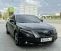 Чорний Тойота Камрі, об'ємом двигуна 2.4 л та пробігом 270 тис. км за 6700 $, фото 1 на Automoto.ua