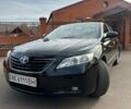 Черный Тойота Камри, объемом двигателя 2.4 л и пробегом 161 тыс. км за 7700 $, фото 1 на Automoto.ua
