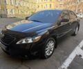 Чорний Тойота Камрі, об'ємом двигуна 2.4 л та пробігом 260 тис. км за 9200 $, фото 1 на Automoto.ua