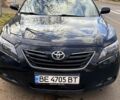 Чорний Тойота Камрі, об'ємом двигуна 2.4 л та пробігом 263 тис. км за 9500 $, фото 1 на Automoto.ua